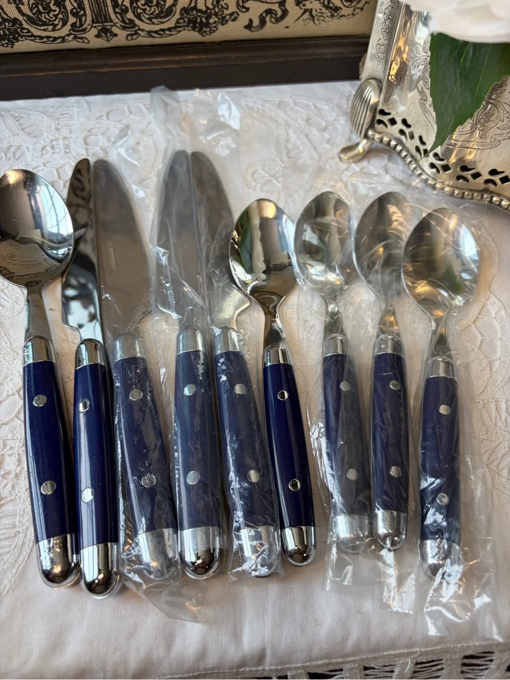 Blue & silver flatware set spoons and knives